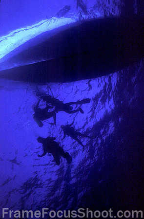 Divers underboat