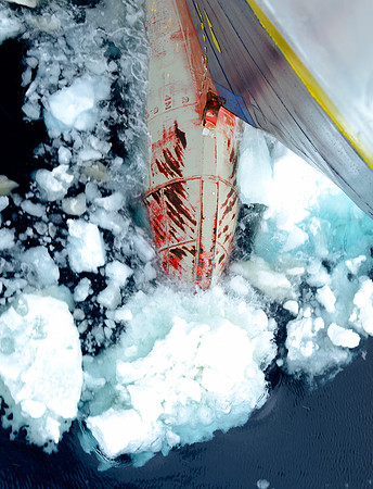 Explorer breaking through the ice.