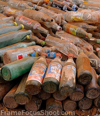 Road dust covered bottles.